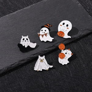 Detailed close-up of 5-piece Halloween ghost enamel pins set with pumpkin and boo flag