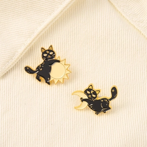 Creative black cat enamel pins with sun and moon designs featuring gold celestial patterns