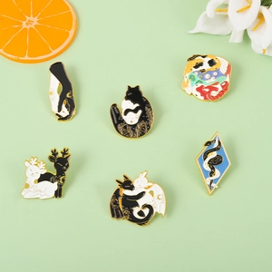 Set of 6 Yin Yang enamel pins featuring koi fish, cats, and dragons with gold plating