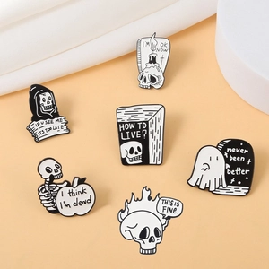 Set of 6 punk skull enamel pins in black and white with dark humor themes on a clean background