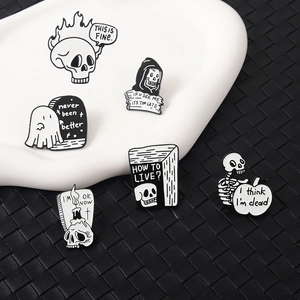 Punk skull enamel pins set with ghost and flame designs in black and white finish