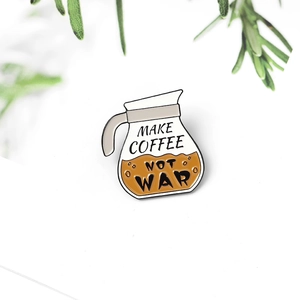 Cute coffee pot enamel pin with Make Coffee Not War slogan on white background