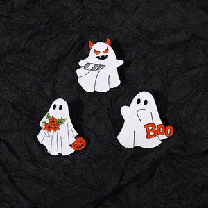 Three-piece Halloween ghost enamel pin set with pumpkin and Boo lettering on black background