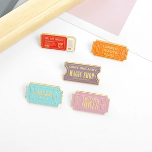 Five colorful enamel stamp pins set with magic shop and dream letter engravings