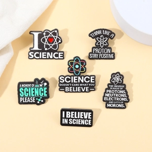 Collection of 6 science theme enamel pins with lab equipment and atom designs