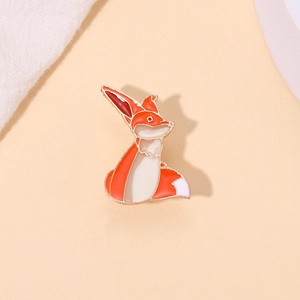 Broche renard mignon en émail orange et blanc pour vêtements et sacs à dos
