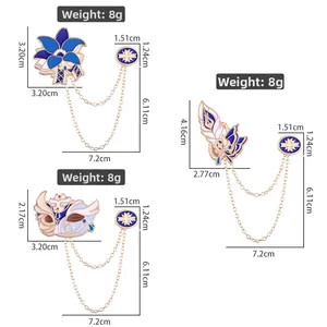 Detailed view of three alloy enamel pins with golden chains and specific measurements