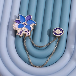 Exquisite blue enamel flower chain brooch with golden star badge on blue wavy background