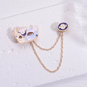 Detailed view of anime-style mask and star badge brooch with alloy link chain on stone texture