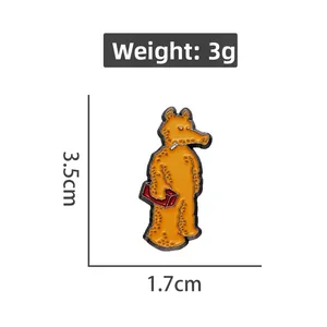 Enamel lapel pin with yellow crocodile character carrying a red briefcase, 3.5cm height