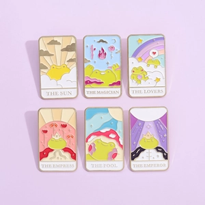 Detailed set of six cartoon frog tarot enamel pins in soft pastel colors and cute design