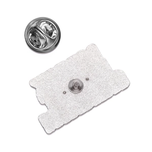 Silver alloy pin back detail showing secure butterfly clutch and metal texture