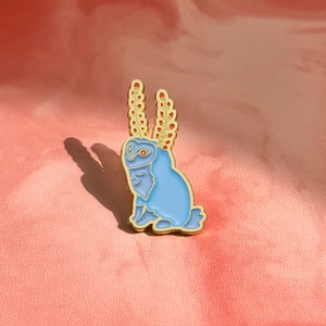 Detailed close-up of a creative blue owl alloy brooch with textured enamel finish