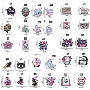 Collection of 24 Halloween enamel pins featuring cats, magic bottles and gothic designs