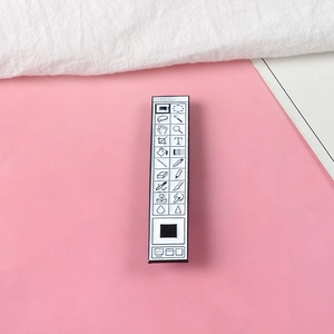 Creative Photoshop toolbar enamel pin with classic software icons on metal badge