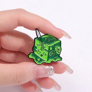 Green slime enamel pin with silver sword and skull design for fantasy lovers