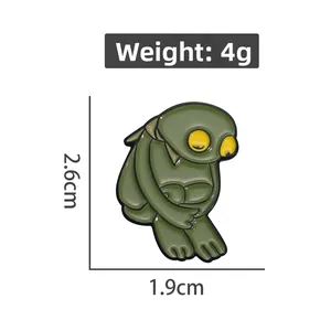Insigne en émail personnage grenouille triste, dimensions 2,6cm par 1,9cm et poids de 4g