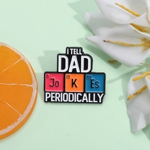 Detailed close-up of Father's Day enamel pin with humorous Periodic Table wordplay design