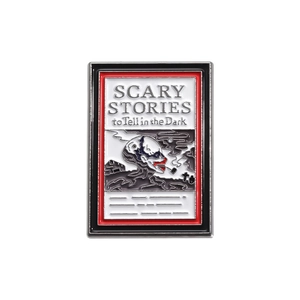 Scary Stories to Tell in the Dark enamel pin with skull illustration and red text