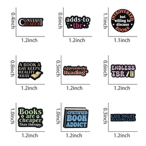 Detailed view of nine colorful bookworm enamel pins with specific size measurements