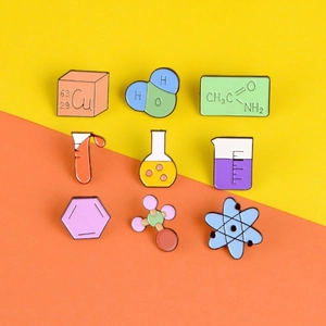Set of 9 colorful enamel science pins featuring atoms, test tubes and chemical elements