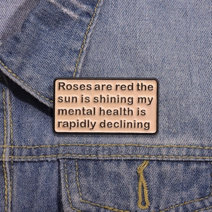 Pink enamel brooch with funny slogan on denim jacket, creative metal badge accessory