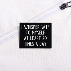 Funny metal enamel pin with 'I WHISPER WTF TO MYSELF' quote on white canvas bag