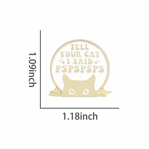 Detail of round enamel pin with funny cat quote and gold metal trim showing dimensions