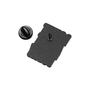 Detail view of the matte black zinc alloy metal brooch back with rubber butterfly clutch