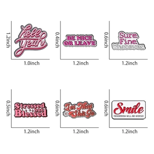 Detailed size measurement view of six creative enamel pins with inspirational letters