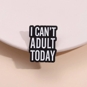 Minimalist rectangular enamel pin with I CAN'T ADULT TODAY text in black and white
