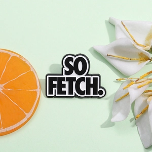 Creative SO FETCH black enamel brooch pin with bold white lettering on green background