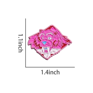 Detailed view of pink cartoon monster enamel pin measuring 1.4 by 1.1 inches