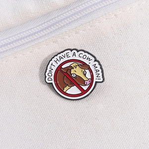 Funny enamel pin with cow head and text DON'T HAVE A COW, MAN! on canvas bag