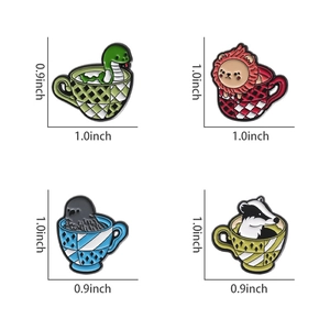 Macro view of four cartoon animal enamel pins in coffee cups with size labels