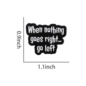 Macro detail of enamel pin with When nothing goes right go left text and dimensions