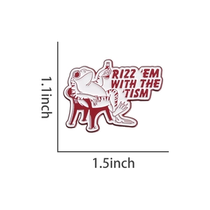 Enamel frog pin with 'RIZZ EM WITH THE TISM' text measuring 1.1 by 1.5 inches