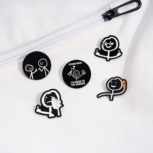 Set de pin's émaillés noirs bonhomme allumette avec texte sur sac en toile blanc
