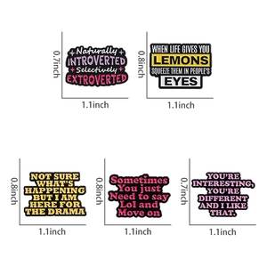 Detailed view of enamel letter pins with size dimensions in inches on white background
