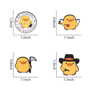 Detailed view of four yellow duck enamel pins with specific size measurements in inches