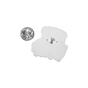 Detail of silver alloy brooch back featuring pin and butterfly clutch closure mechanism