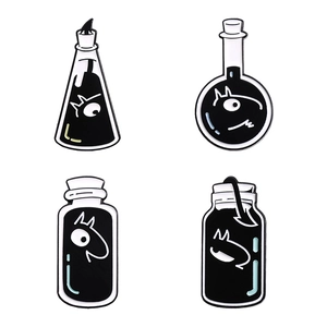 Set of four cartoon black and white enamel pins featuring lab flask cat character designs
