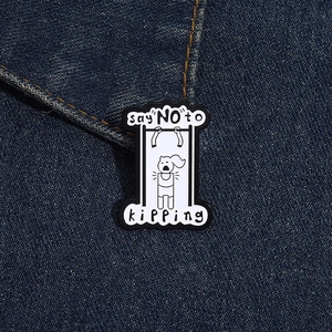 Detailed close-up of a funny pull-up fitness enamel pin on denim fabric background