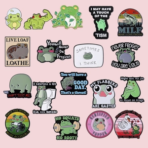 Creative collection of 17 funny green frog enamel pins with humorous pun quotes