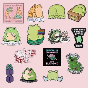Collection of creative cute frog enamel pins featuring funny cartoon meme designs