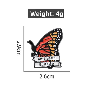 Detail of Anti-Social Butterfly enamel pin with orange wings and size measurements