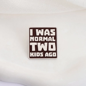 Funny square enamel brooch with I WAS NORMAL TWO KIDS AGO quote on textured background