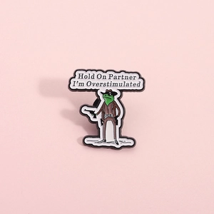 Funny cowboy frog enamel pin with Hold On Partner I'm Overstimulated text for denim jackets
