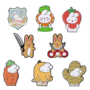 Set of 8 cute cartoon rabbit enamel pins featuring fruit and vegetable bunny designs