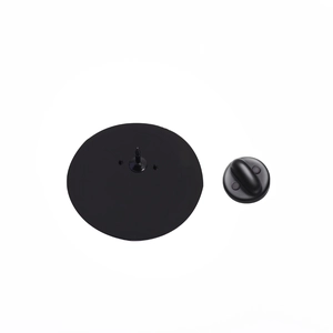 Detailed back view of a round enamel brooch featuring a matte black finish and pin back